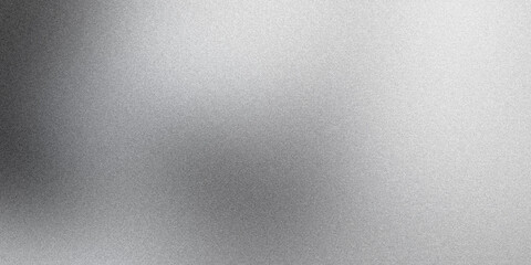 Metallic surface with a grainy texture and subtle gradient, ideal for backgrounds and design projects