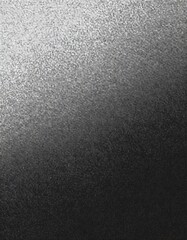 Obraz premium A smooth grayscale gradient with a dotted texture transitioning seamlessly from light to dark in minimalistic style.