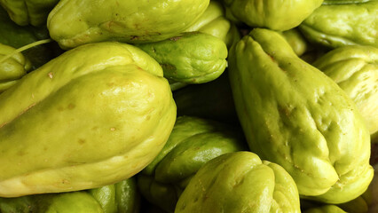 Labu siam, also known as chayote or vegetable pear, is a type of squash that belongs to the gourd family (Cucurbitaceae-Sechium edule)