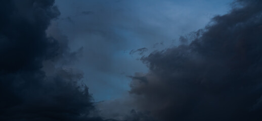 Cloud storm sky dark halloween background rain lightning thunder stoumy typhoon Nature light scene...