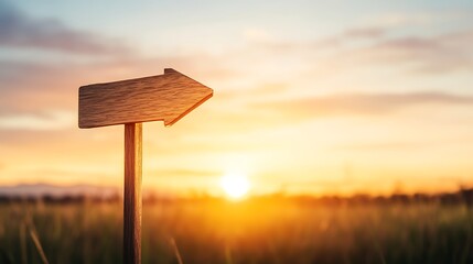 Wooden Arrow Signpost at Sunset
