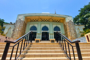 Fototapeta premium Ceramic stairs of a modern mosque against a blue sky