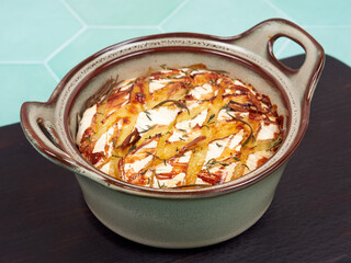 Baked Camembert with Herbs and Honey in Ceramic Dish