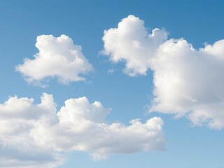 Fototapeta premium Serene day with fluffy white clouds scattered across the blue sky, blue sky background with clouds, soft focus, gentle hues