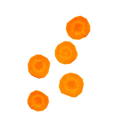 Pieces of falling round carrot slices isolated on white, clipping path, PNG