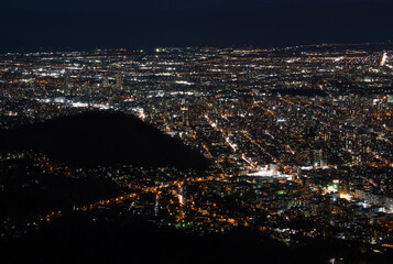 Obraz premium 札幌藻岩山山頂展望台からみた札幌のビル群の街並み