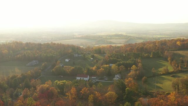 Aerial view of colorful autumn foliage over serene hills and tranquil valleys, Frederick, United States.