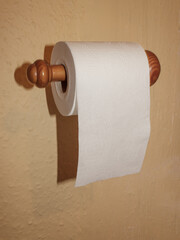 Illustration of dispute that has caused heated discussions and divided families, should toilet roll unwind from the front or the back and it's still to be decided which is right and which is wrong