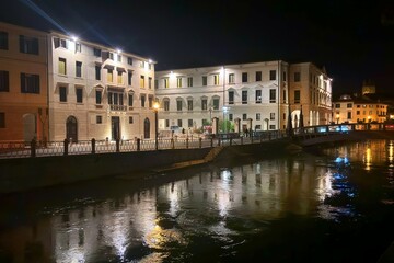 Naklejka premium paesaggio urbano di notte, treviso, italia, cityscape by night, treviso, italy 