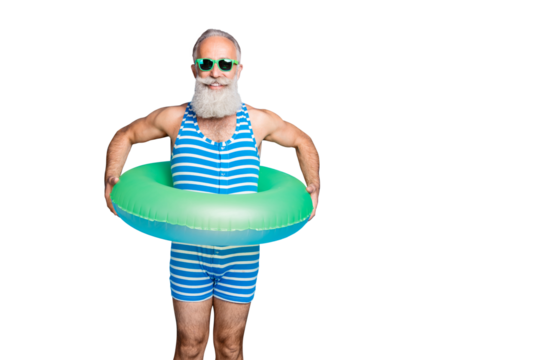Portrait of cheerful man with eyeglasses eyewear holding rubber ring life belt wearing swim wear isolated over blue background