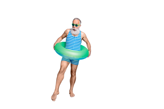 Full size photo of shocked man with rubber ring trying temperature of water screaming omg wearing eyeglasses eyewear isolated over blue background