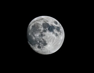 Naklejka premium Full moon illuminating the night sky, representing lunar phases, astronomy, and nighttime beauty.