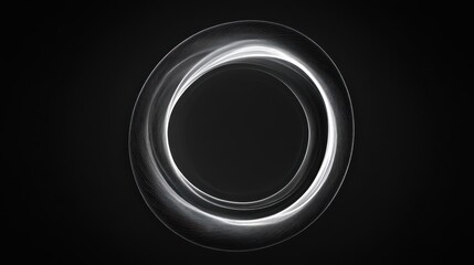 Swirling Silver Ring on Dark Background Signifying Infinity and Flowing Energy