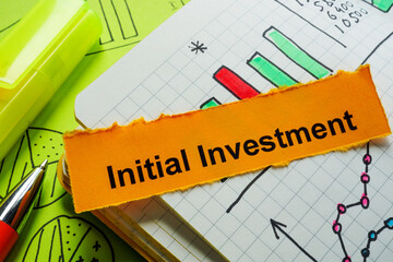Notebook with notes on initial investment. Financial planning.