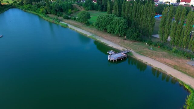 Wooden Dock At Badeteich Hohenau - Swimming Lake In Hohenau an der March, Austria. - aerial descend shot