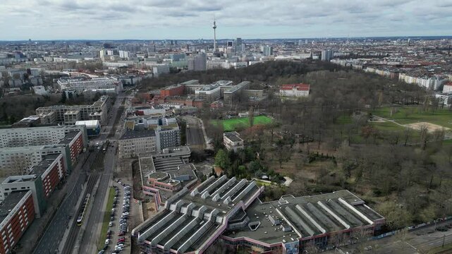 Aerial view of the former east German sport and event location surrounded by urban architecture and green spaces, Berlin, Germany.