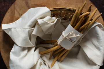 Top view of fried corn stick snack in a linen lined basket, Overhead view of nigerian kokoro corn...