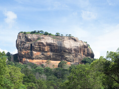 Sigiriya, Sri Lanka. Sigiriya seen from the distance. Sigiriya (meaning Lion Rock) is an ancient palace located in the central Matale District, Sri Lanka.