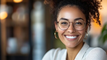Obraz premium Close up of a smiling employee on a video call engaging with remote colleagues featuring themes of inclusivity and connection with space for text