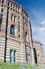 A view of the Gasometer city from the metro station. The Gasometers are four former gas tanks, used...