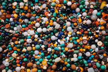 Fototapeta premium Background of colourful elements for bracelets displayed at a shop in Tianjin, China