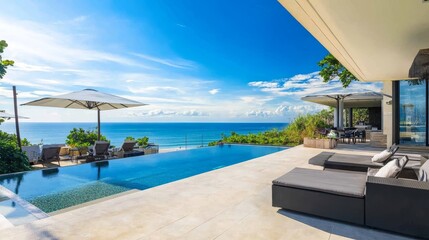 Fototapeta premium Luxury Tropical Poolside View, Infinity Pool Deck, Oceanfront Paradise, Relaxing Outdoor Oasis with Sea Horizon