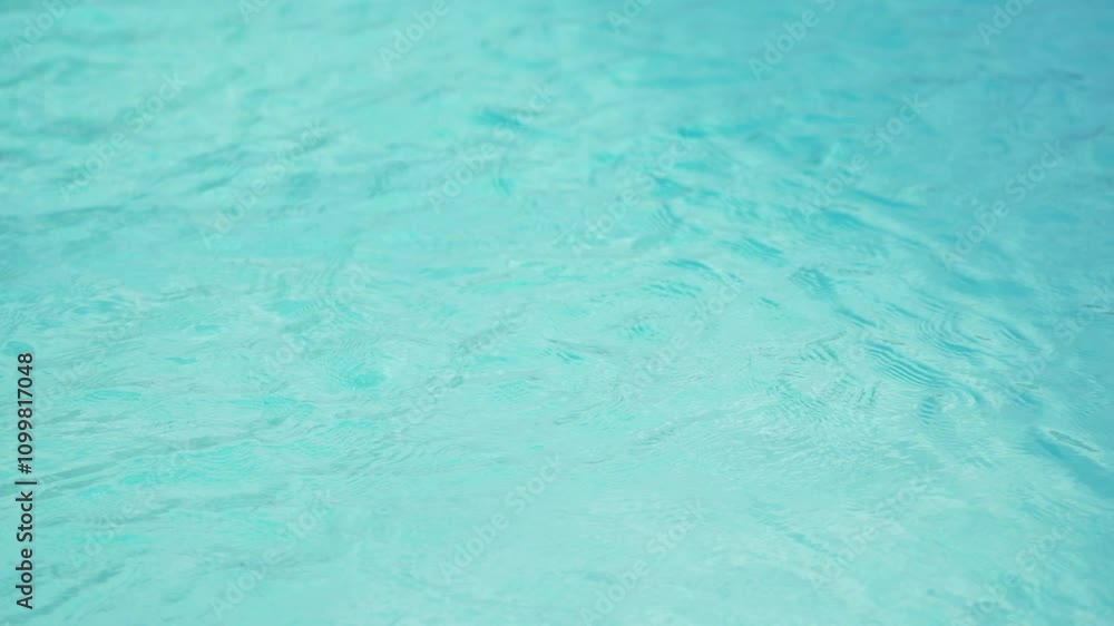 Poster close up of clear turquoise water surface with soft ripples creating a calming effect
