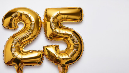 Banner with number 25 made of golden balloon, white backdrop. Birthday anniversary celebration.