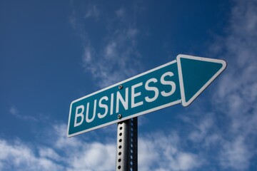 Obraz premium Business word written on a signboard, business and work career concept.