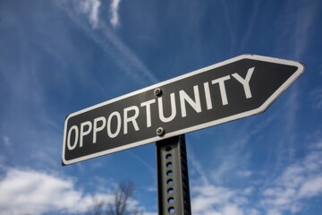 Obraz premium Opportunity word written on a signboard, business and work career concept.