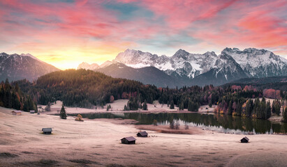 Magical sunrise with illuminated clouds over the Alps