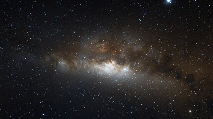 Obraz premium Cosmic wonder: A breathtaking view of a distant galaxy, speckled with countless stars.