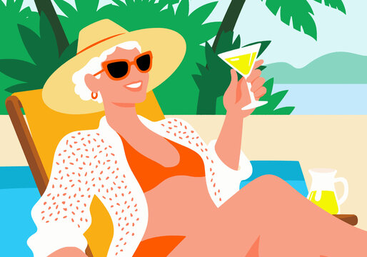 Woman holding drink and resting on deck chair at beach