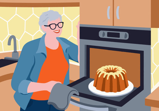 Happy senior woman baking bundt cake in kitchen