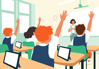 School students and teacher with digital computers learning in classroom