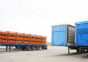 Repsol butane cylinders. Truck trailer loaded with butane gas cylinders for domestic use. Energy supply for the home
