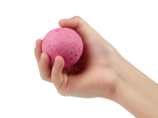 Hand squeezing a pink stress ball, isolated on a white background.  PNG transparent.