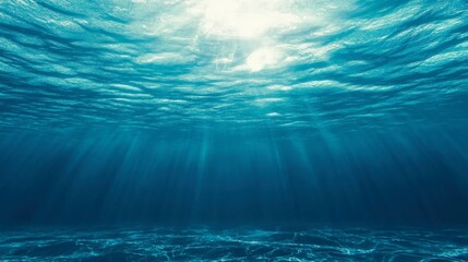 Obraz premium Sunlight Shining Through Calm Ocean Water With Gentle Waves