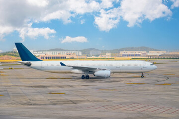 Taxiway runway passenger jet plane ready taking off side view