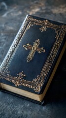 Fototapeta premium A close-up of a Bible with a cross on it, laying flat.
