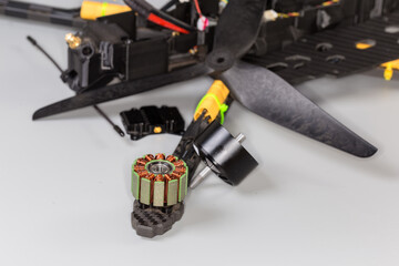 Electric motor of small quadcopter against the other its parts