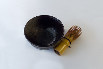 Tea bowl and bamboo whisk for preparing green matcha tea