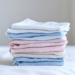 Neatly Folded Stack of Fluffy Towels in Pastel Shades