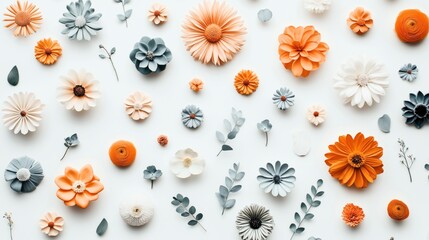 Fototapeta premium Flat lay composition of assorted paper flowers and leaves arranged on a light background, featuring orange, peach, gray, and white colors in various styles and shapes.