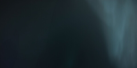 Abstract dark gradient background with subtle light streaks