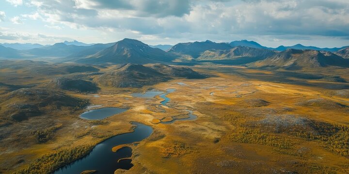 Aerial view of the stunning Putorana plateau captured from a helicopter, showcasing the unique landscape and natural beauty of the Putorana plateau from above in this breathtaking imagery.