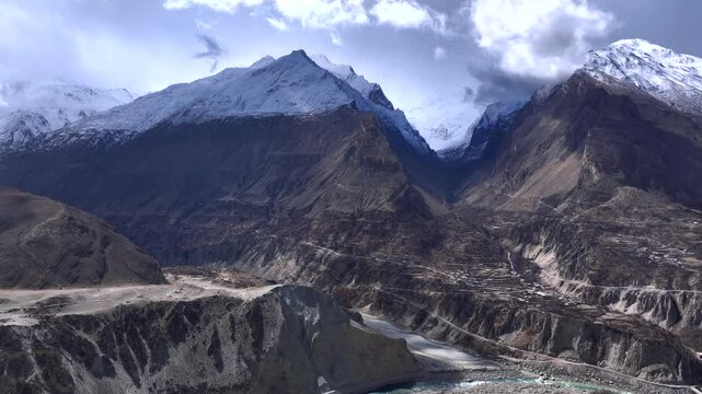 Majestic Himalayan Mountains and Serene Blooming Valley, Greenery and River, Hunza Valley, Gilgit-Baltistan, Pakistan.