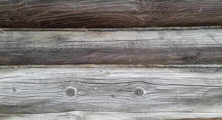 Obraz premium Log house wall. Wooden logs. Destroyed rotten wood.