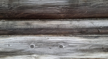 Obraz premium Log house wall. Wooden logs. Destroyed rotten wood.