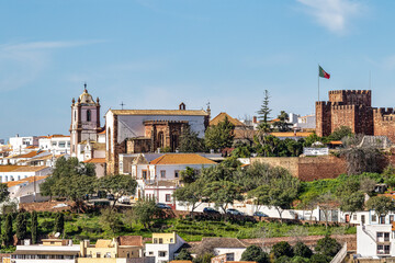 View of Silves town buildings with famous castle and cathedral, Algarve region, Portugal